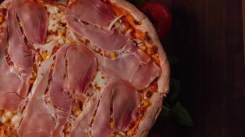 Delicious Ham Pizza on Wood Table
