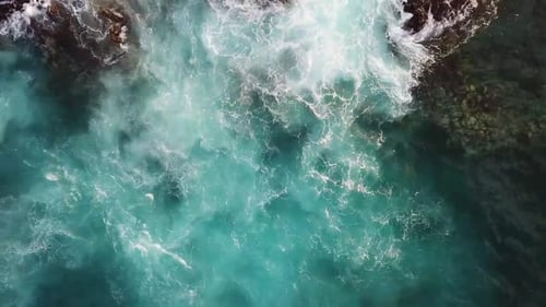 Big blue wave splash near the beach in the ocean - summer vibes and vacation concept