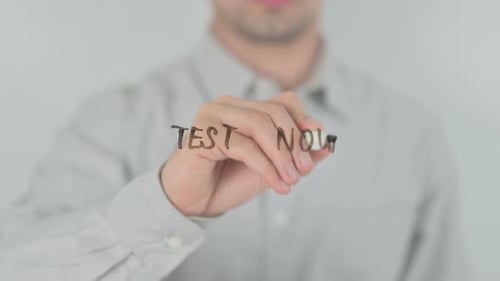 Man Writes 'Test Now' With a Marker