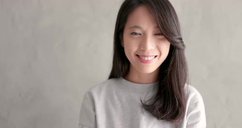 Young Woman Smile to Camera