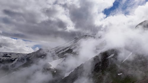foggy snowy mountains