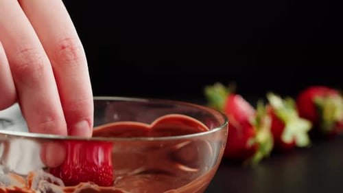 Strawberry in Melted Chocolate Closeup Melting Chocolate Bar for Fondue