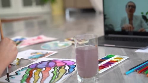 Student Painting During Online Art Class