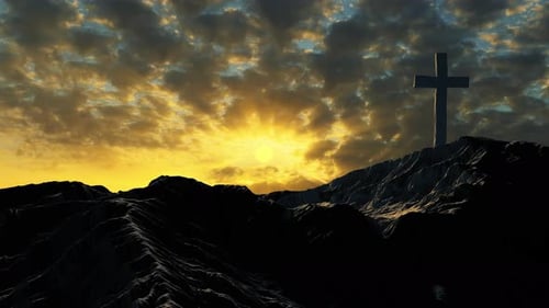 Dramatic Christian Cross on Mountain at Golden Sunset