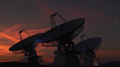 Rotating Radio Telescope Array Under Starry Sunset Sky