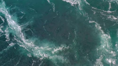 Waves of Water of the River and the Sea Meet Each Other During High Tide and Low Tide.