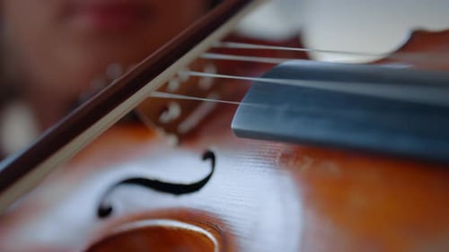 Woman Playing Violin in Close Up Shot