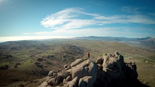 Hiker Traveller on Mountain Summit