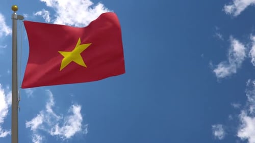 Realistic Waving Vietnam Flag Against Blue Sky