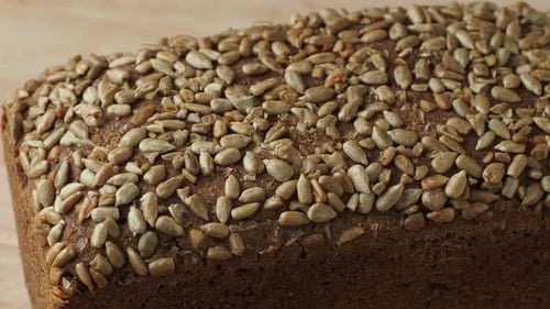 Close-Up of Loaf of Seeded Brown Bread