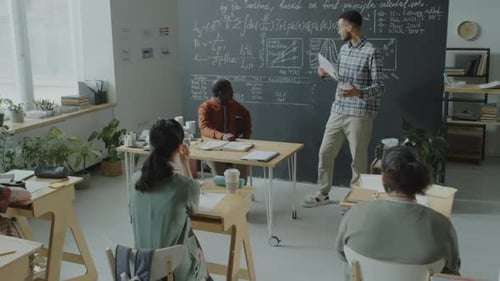 College Student Giving Presentation on Math Lesson