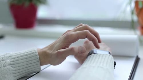 Person Using a Smart Watch, Close Up