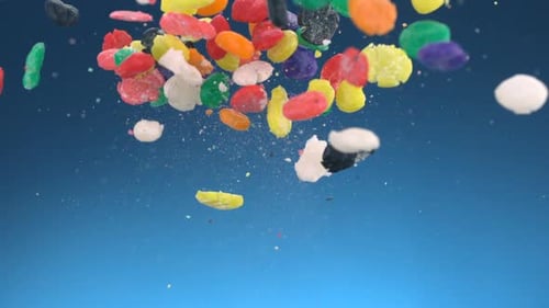Exploding Multicolored Candy Pieces in Slow Motion
