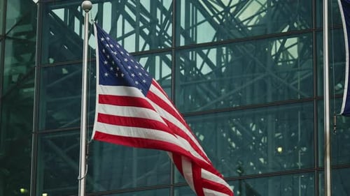 American Flag waving in front of Office Building