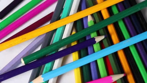 Colored Pencils For Drawing. The Surface With Pencils Rotates. Close Up.