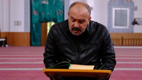 Middle Age Man Read Quran Mosque