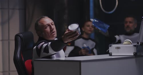 Astronauts Discussing Mission Logistics in Space Station