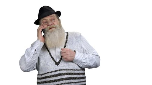 Senior Man with Beard Talking on Mobile Phone
