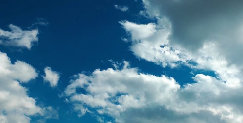 Time Lapse of Clouds Across Blue Sky