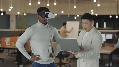 Man Using VR Headset in Modern Office
