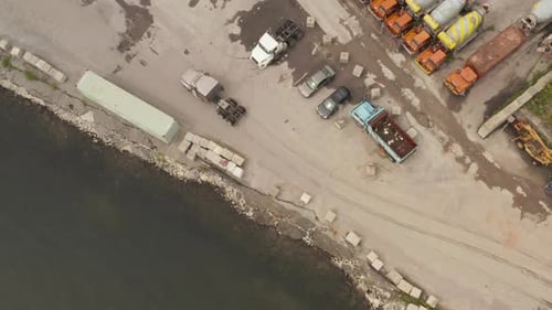 Top Down Birds Eye View Aerial View Following a Truck Without a Trailer Arriving Into the Port