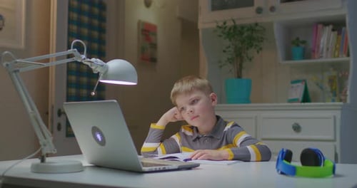 Preschool Child Is Tired of Studying Online at Home