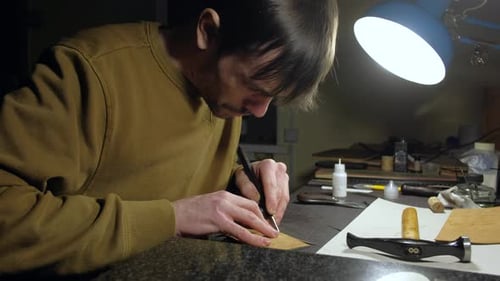 Tanner Working in Workshop