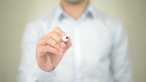 Writing the Word Idea on a Clear Surface