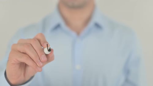 Man Writing Workforce on Glass Surface