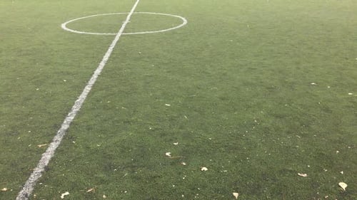 Artificial surface of football sport background 4K 2160p 30fps UltraHD footage - Green grass and