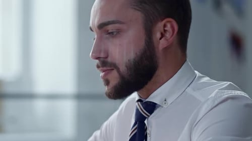 Handsome Entrepreneur Video Calling on Laptop