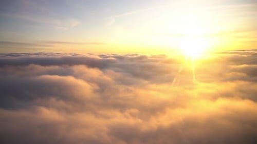 Golden Sun And Soft White Clouds
