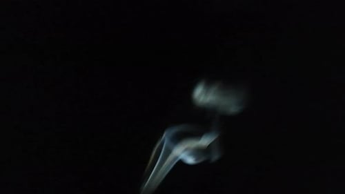 Abstract White Smoke Against a Black Background