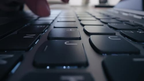 Typing on Laptop Keyboard Close Up Detail