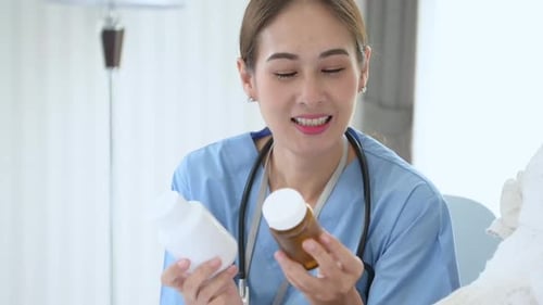 A doctor is discussing taking medication to an elderly patient