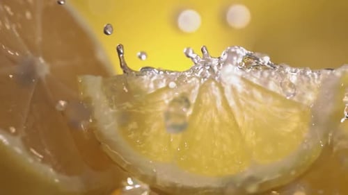 Close Up of Sliced Lemon with Water Splash
