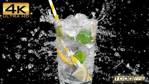 Iced refreshing drink splashes on a black background