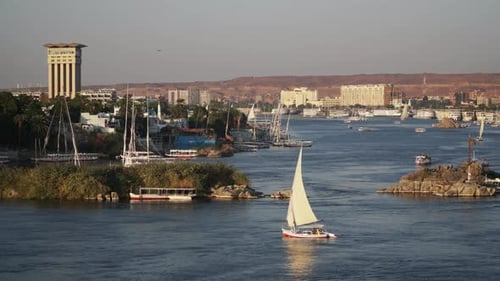 Beautiful Felucca Boats on Nile River Passing By Aswan