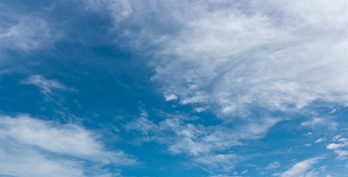 Blue Sky and Clouds Moving Gently