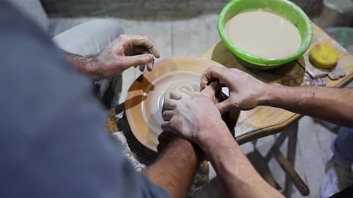 Making a Handmade Clay Pot in the Workshop. Pottery Lesson with Master.