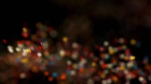 Colorful Candies Swirling on a Dark Background