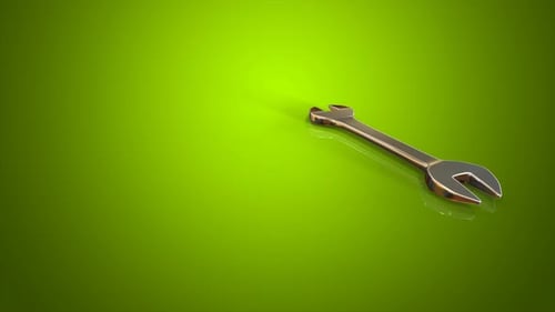 Animated 3D Wrench Tool Rotating on Green Background