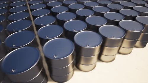 Rows of Industrial Oil Barrels Moving Seamlessly