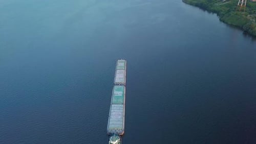 Cargo Ship Floating on River
