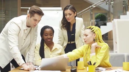 Hardworking Young Businessmen Four People are Having a Discussion with Colleagues in the Office