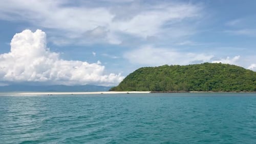 Boat Fast Floats Near Island