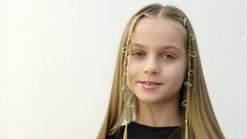 Teen with Braids and Yellow Eye Makeup