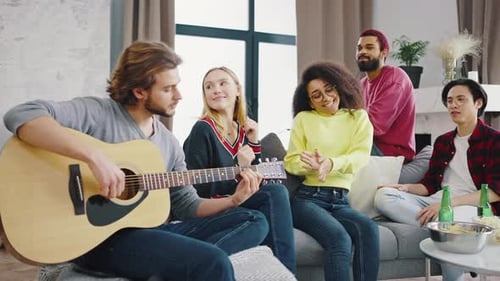 Friends Enjoying Live Music Together at Home