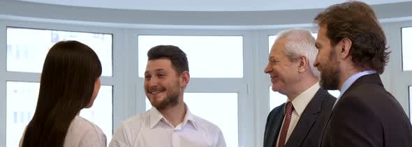 Business People Hihg-fiving at the Office