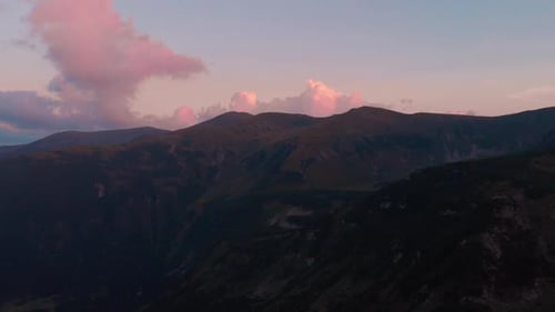 Aerial View of Mountain Range at Sunrise or Sunset